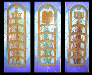 Three completed panels: The Star, The Tablets and The Menorah